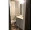 Bathroom featuring a standard toilet, vanity, mirror and sink at 1257 Dal Maso Dr, Daytona Beach, FL 32117