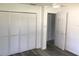 The bedroom features vinyl floors, ceiling fan, and closet with doors at 1257 Dal Maso Dr, Daytona Beach, FL 32117