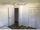 Bedroom with a closet and a door leading to another room at 1257 Dal Maso Dr, Daytona Beach, FL 32117