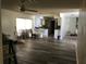 A large, open-concept area showcasing the living room and kitchen layout at 1257 Dal Maso Dr, Daytona Beach, FL 32117