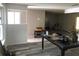 Spacious living area showcasing an open floor plan, neutral tones, and modern flooring at 1257 Dal Maso Dr, Daytona Beach, FL 32117