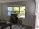 Bright living area featuring a large window offering natural light and lovely outdoor views at 1257 Dal Maso Dr, Daytona Beach, FL 32117