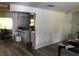 An unfurnished view of an open floor plan showing the kitchen from the living room at 1257 Dal Maso Dr, Daytona Beach, FL 32117