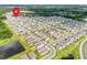 An aerial view of the community showcasing the well-planned neighborhood and nearby lake at 1335 Berry Ln, Davenport, FL 33837