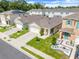 Charming single-Gathering home with well-manicured landscaping and a two-car garage at 1335 Berry Ln, Davenport, FL 33837