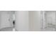 Hallway view into laundry room and bedroom at 1335 Berry Ln, Davenport, FL 33837