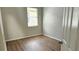 Bright bedroom with wood floors and a window offering natural light at 2528 Ladoga Dr, Lakeland, FL 33805
