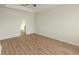 Inviting bedroom showcasing elegant tray ceilings and modern wood-look flooring, ideal for creating a restful retreat at 2528 Ladoga Dr, Lakeland, FL 33805