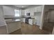 Kitchen with granite countertops, stainless appliances, and white cabinetry at 2528 Ladoga Dr, Lakeland, FL 33805