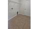 Functional laundry room with tile flooring, washer/dryer hookups, and ample storage space, making chores a breeze at 2528 Ladoga Dr, Lakeland, FL 33805