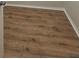 Close up view of wood-look flooring offering durability and beauty, perfect for modern living spaces at 2528 Ladoga Dr, Lakeland, FL 33805