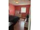Comfortable bedroom with hardwood floors and ample closet space for storage at 3435 Swindell Rd, Lakeland, FL 33810