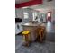 Bright kitchen with island, granite countertops, and yellow stools, great for entertaining at 3435 Swindell Rd, Lakeland, FL 33810