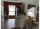 Open kitchen with stainless steel appliances, breakfast bar, and cozy dining area at 9053 Lee Vista Blvd # 1405, Orlando, FL 32829
