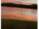 Scenic lake view showcasing the calm waters and natural surroundings, adding to the property's appeal at 9053 Lee Vista Blvd # 1405, Orlando, FL 32829
