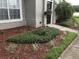Beautifully landscaped front yard with well-maintained flowerbeds at 9053 Lee Vista Blvd # 1405, Orlando, FL 32829