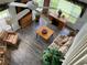 Cozy living room featuring a ceiling fan, wood furniture, and floral-patterned sofa in a bright setting at 9053 Lee Vista Blvd # 1405, Orlando, FL 32829