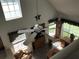 Living room with vaulted ceilings, hardwood floors and a ceiling fan at 9053 Lee Vista Blvd # 1405, Orlando, FL 32829