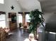 Cozy living room featuring lots of natural light and a large tree at 9053 Lee Vista Blvd # 1405, Orlando, FL 32829