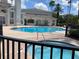 Resort-style pool with a hot tub, lush greenery, and ample space for relaxation and recreation in this community at 9053 Lee Vista Blvd # 1405, Orlando, FL 32829