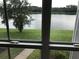 Scenic view of the lake and lush green landscape at 9053 Lee Vista Blvd # 1405, Orlando, FL 32829