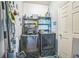 Laundry room features modern washer, dryer, and storage, combining functionality with practical design at 4931 Jetton Dr, Orlando, FL 32837