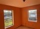 This bedroom boasts two windows, allowing natural light to fill the space at 1629 Lindsey Ter, Deltona, FL 32725