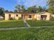 Charming single-story home with well-kept front yard and inviting entrance at 1629 Lindsey Ter, Deltona, FL 32725