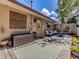 Cozy deck area with outdoor seating, perfect for relaxing and enjoying the backyard at 6909 Farris Dr, Lakeland, FL 33811