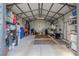 This garage space is super large with a high ceiling, providing ample storage and workspace opportunities at 6909 Farris Dr, Lakeland, FL 33811