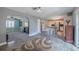 Open-concept living room with wood flooring and lots of natural light at 6909 Farris Dr, Lakeland, FL 33811