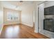Bright bedroom with a ceiling fan and an adjacent laundry room at 9349 Mira Valle Ln, Winter Garden, FL 34787
