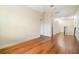 Hallway with hardwood floors connecting multiple rooms on the second floor at 9349 Mira Valle Ln, Winter Garden, FL 34787