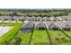 Aerial shot of the backyards of multiple homes, showcasing yard sizes and privacy fences at 2132 Limestone Trl, Kissimmee, FL 34747