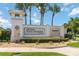 Community entrance sign with the Four Seasons at Orlando logo and decorative landscaping at 2132 Limestone Trl, Kissimmee, FL 34747