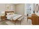 Bedroom showcasing natural light and decorated with neutral color schemes and modern furniture at 4235 Prima Lago Dr, Lakeland, FL 33810