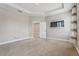 Well-lit primary bedroom with neutral carpet and modern trim work at 4235 Prima Lago Dr, Lakeland, FL 33810