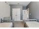 Bedroom featuring two twin beds, neutral paint, carpet, and closet at 4235 Prima Lago Dr, Lakeland, FL 33810