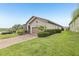 Well-kept home featuring a decorative driveway and lush green lawn at 4235 Prima Lago Dr, Lakeland, FL 33810