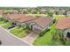 Beautiful home with a landscaped front yard, paved driveway, and an attached garage, offering comfort and convenience at 4235 Prima Lago Dr, Lakeland, FL 33810