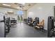 The gym features a variety of modern weight machines, free weights, and mirrors to enhance your workout at 4235 Prima Lago Dr, Lakeland, FL 33810