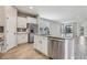 Kitchen with stainless steel appliances, granite countertops, and ample storage space with island at 4235 Prima Lago Dr, Lakeland, FL 33810