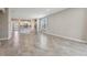 Open-concept living area with tile floors and an eat-in kitchen at 4235 Prima Lago Dr, Lakeland, FL 33810