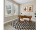 Office with modern decor, large windows and neutral walls at 4235 Prima Lago Dr, Lakeland, FL 33810