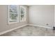 Bright room featuring neutral walls, baseboards and tile flooring at 4235 Prima Lago Dr, Lakeland, FL 33810
