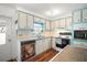 Functional kitchen with updated appliances, ample cabinet space, and a bright window over the sink, creating a delightful cooking experience at 932 Cassandra Ln, Lakeland, FL 33809