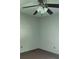 Cozy bedroom featuring neutral wall colors, a ceiling fan with lights, and two electrical outlets at 2505 W Parker St, Lakeland, FL 33815
