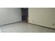 Spacious living room featuring neutral wall colors and tile flooring at 2505 W Parker St, Lakeland, FL 33815