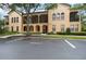 Attractive condo building with well-maintained landscaping and convenient guest parking at 504 Mirasol Cir # 102, Kissimmee, FL 34747