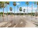 Whimsical water fountain surrounded by palm trees and benches offering a relaxing atmosphere at 504 Mirasol Cir # 102, Kissimmee, FL 34747